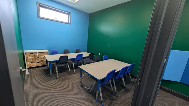 Art classroom with tables and chairs